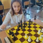 Uczestnicy turnieju szachowego.